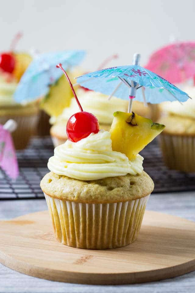 cupcake with a cherry and umbrella