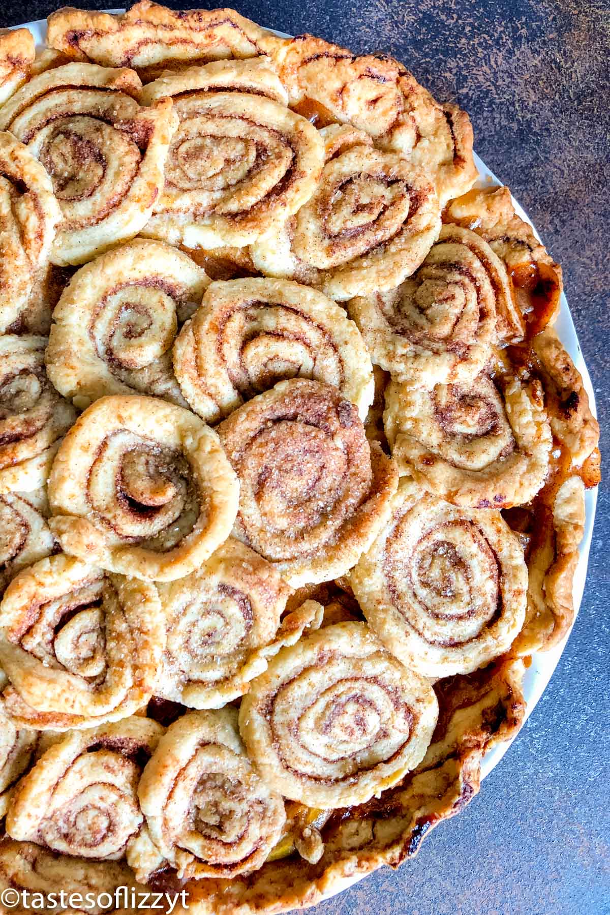 Cinnamon Roll Apple Pie | Tastes of Lizzy T