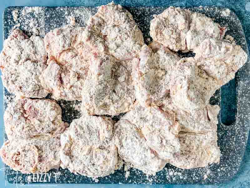 A close up of floured pork tenderloin