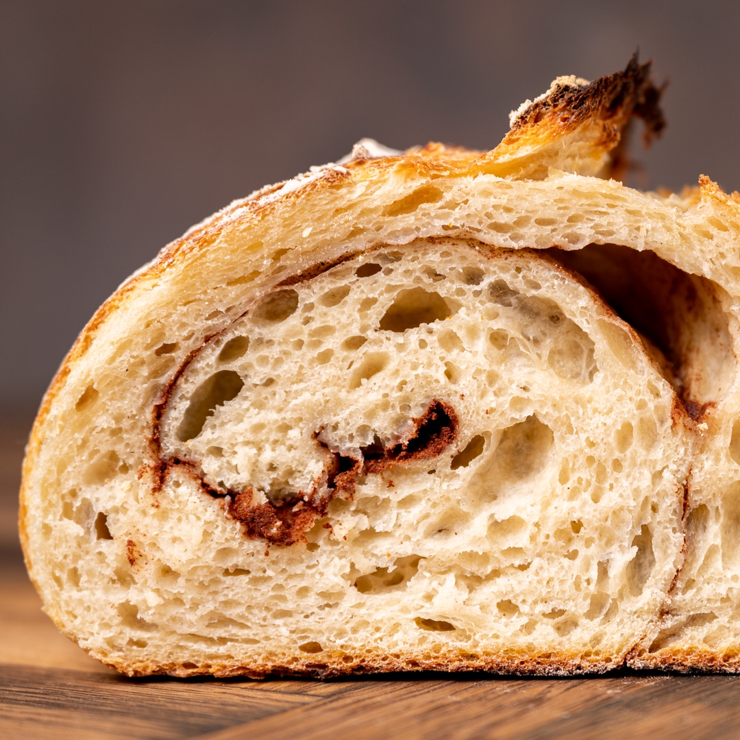 inside of a loaf of cinnamon swirl sourdough bread