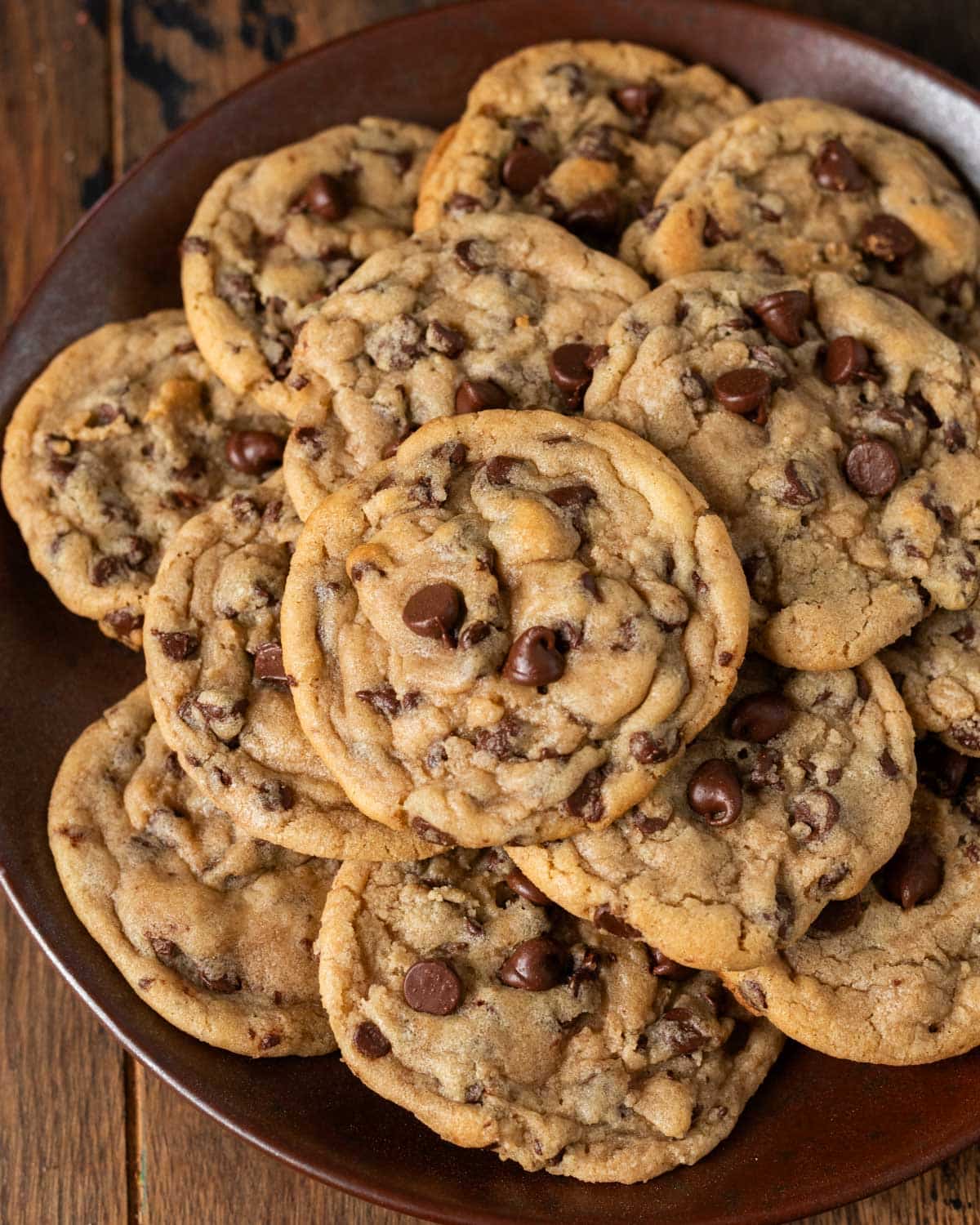 a plate of chocolate chip cookies