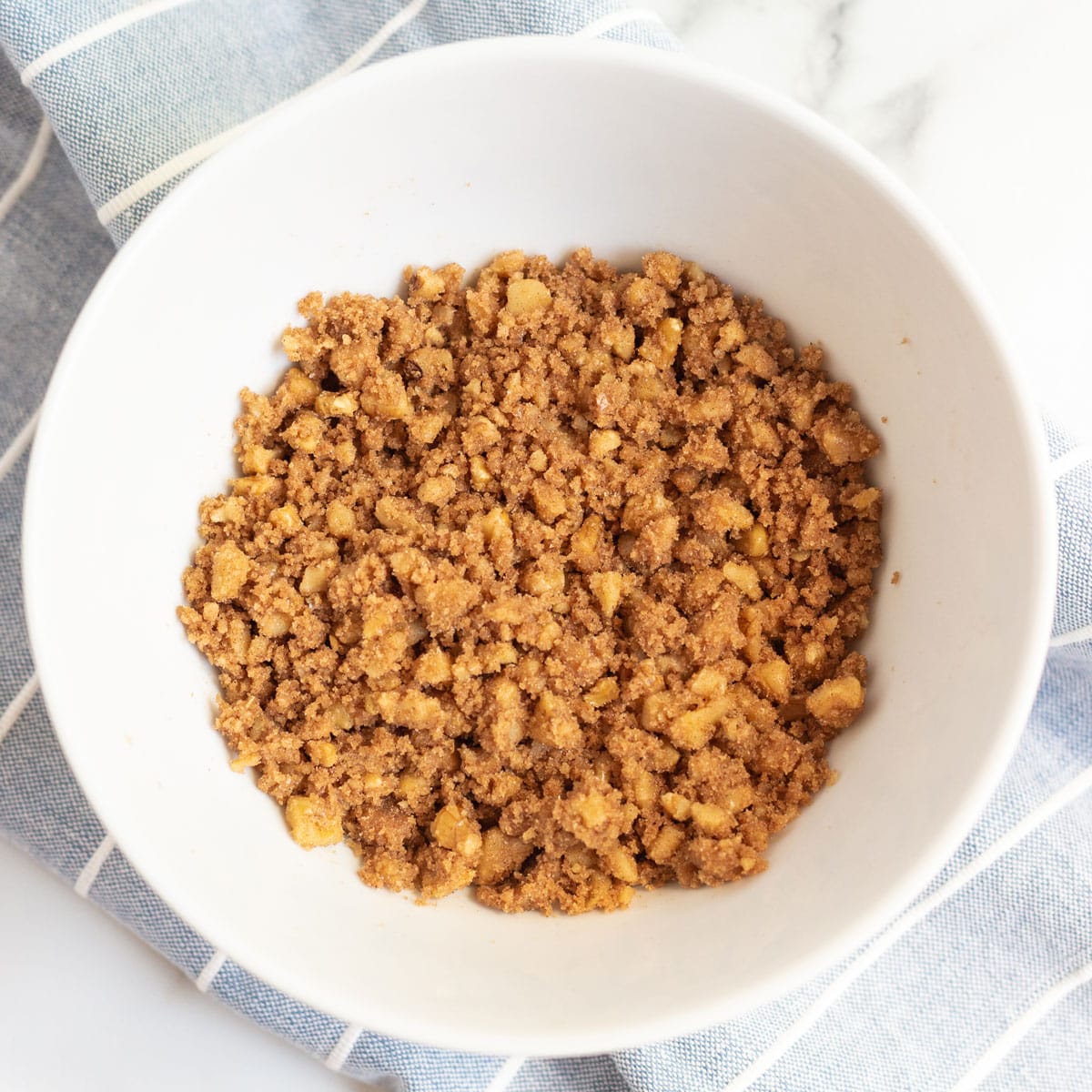 streusel for caramel apple muffins in a bowl