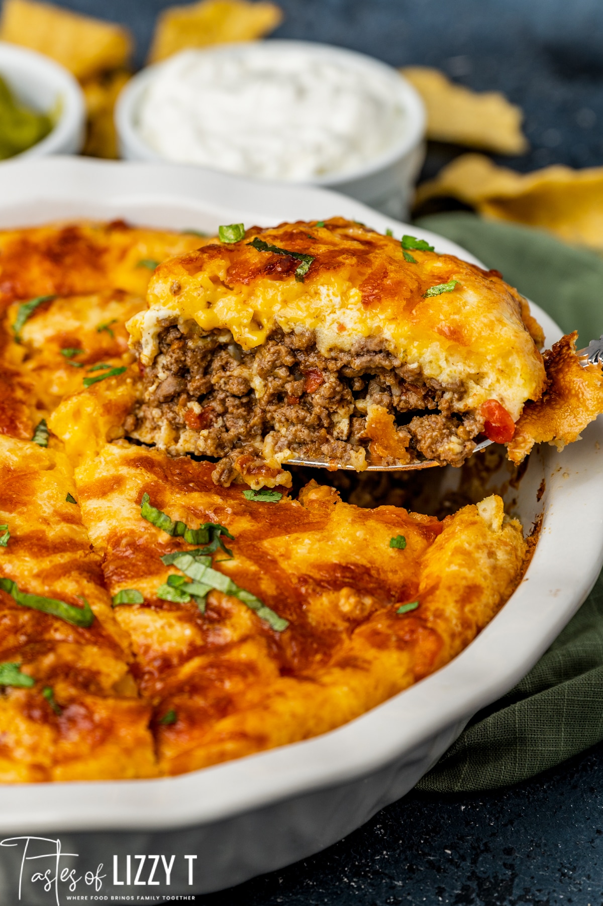 a slice of impossible taco pie on a spatula