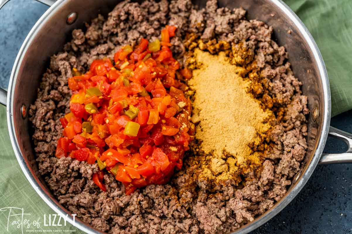 ground beef, seasoning and rotel in a bowl