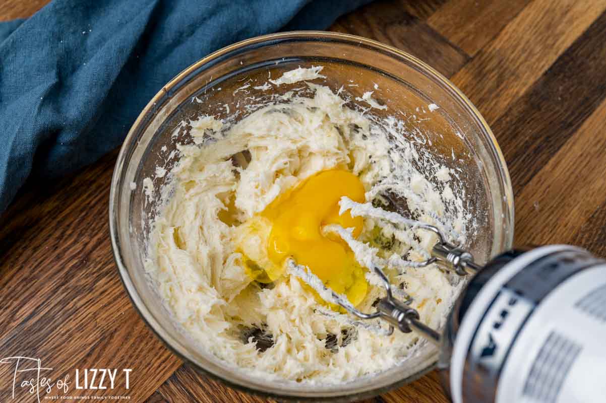 egg mixing into cream cheese