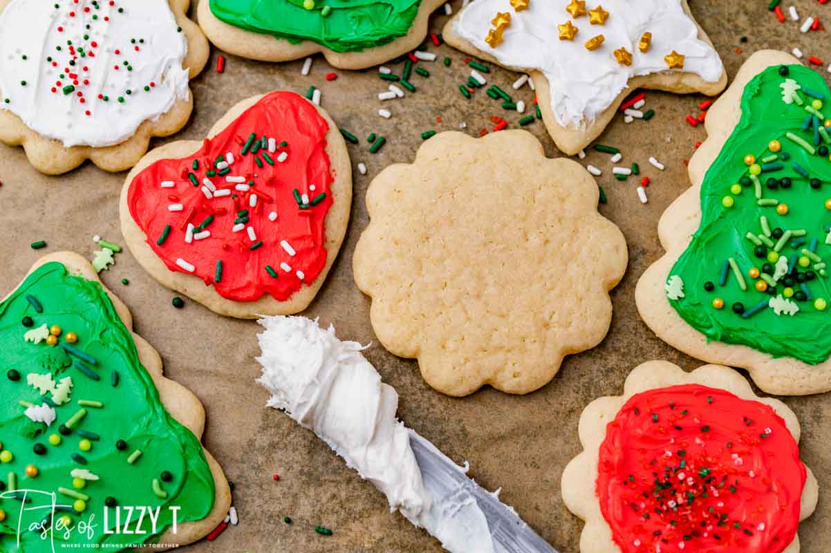 sugar cookies with red and green frosting and sprinkles