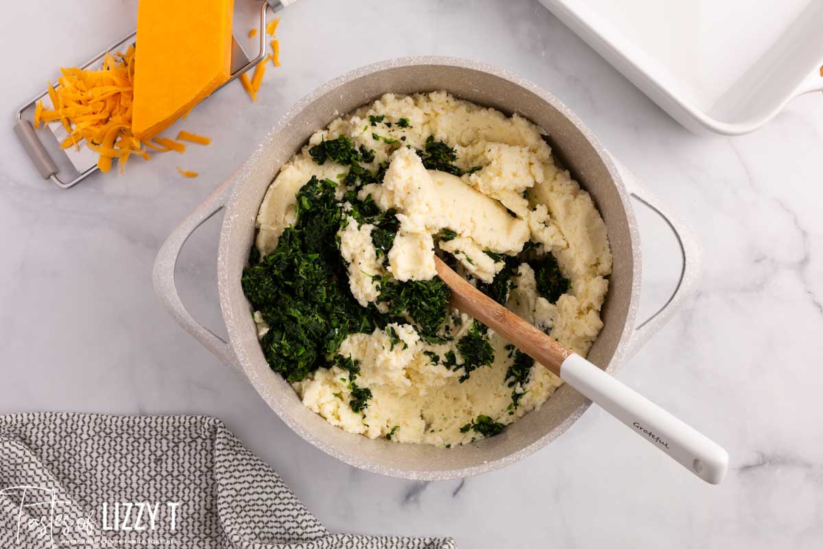 spinach mixing into mashed potatoes