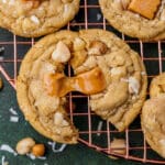 coconut cookies with caramel on a wire rack