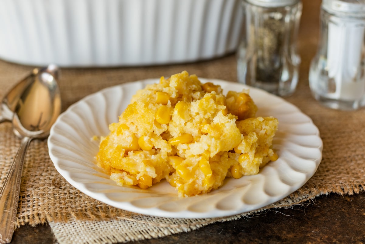 a plate of corn casserole on a table