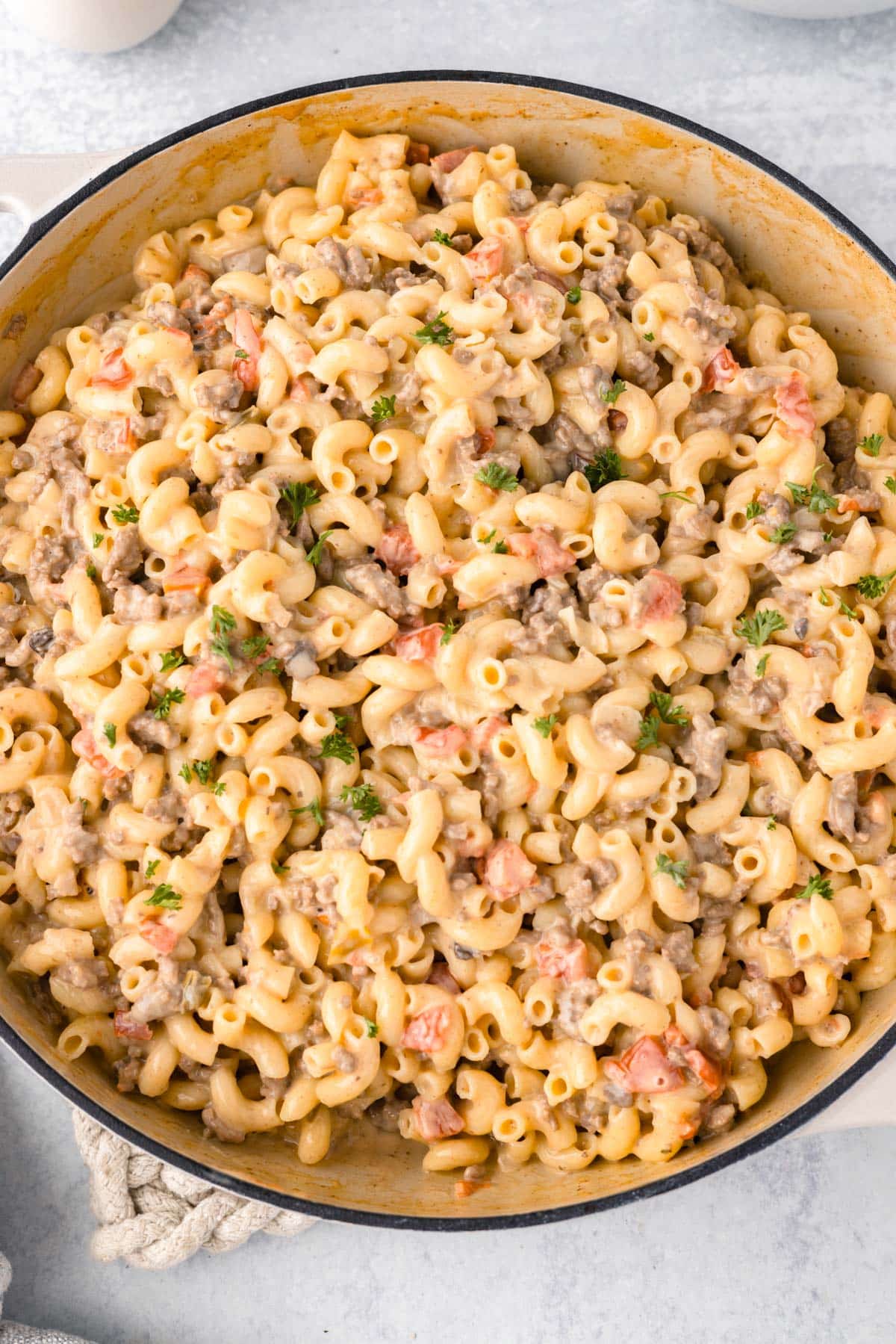 overhead view of hamburger mac and cheese in a pan