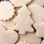 cut out cream cheese sugar cookies on a table