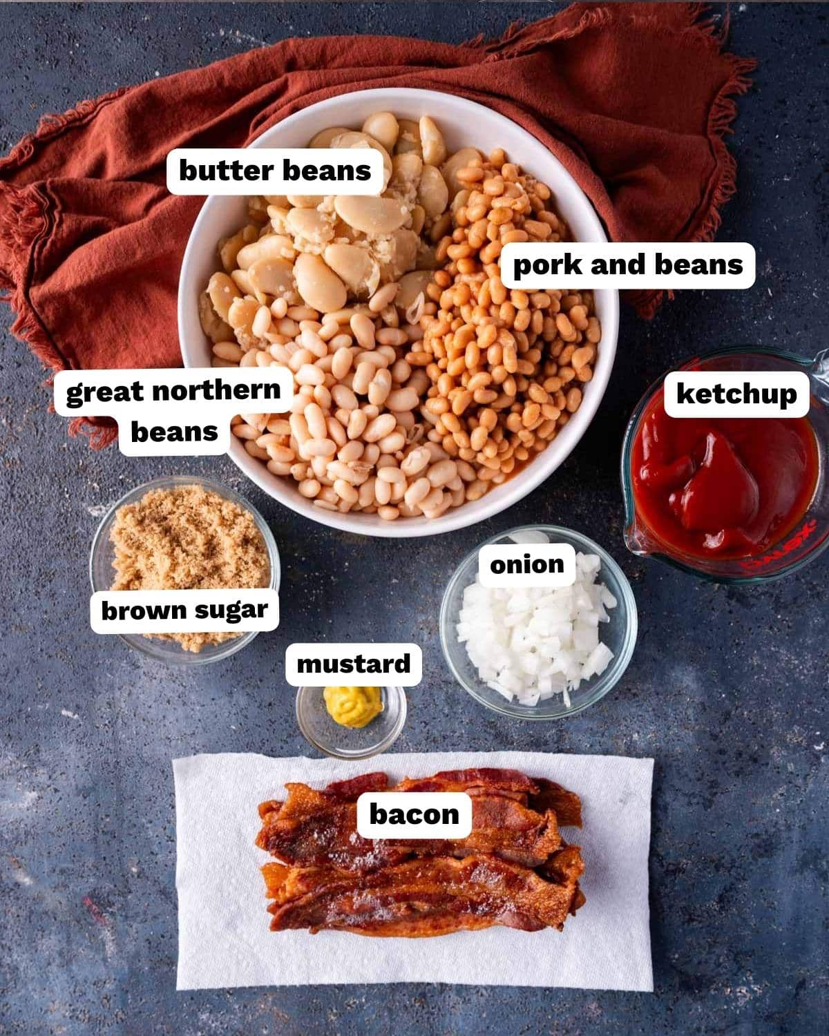 ingredients for 3 bean baked beans on a table