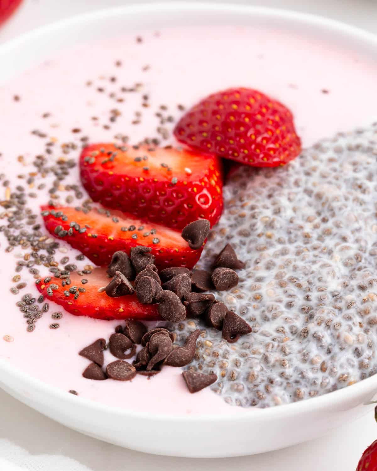 chia smoothie bowl with strawberries and chocolate chips