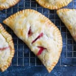 overhead view of a plum turnover on a wire rack