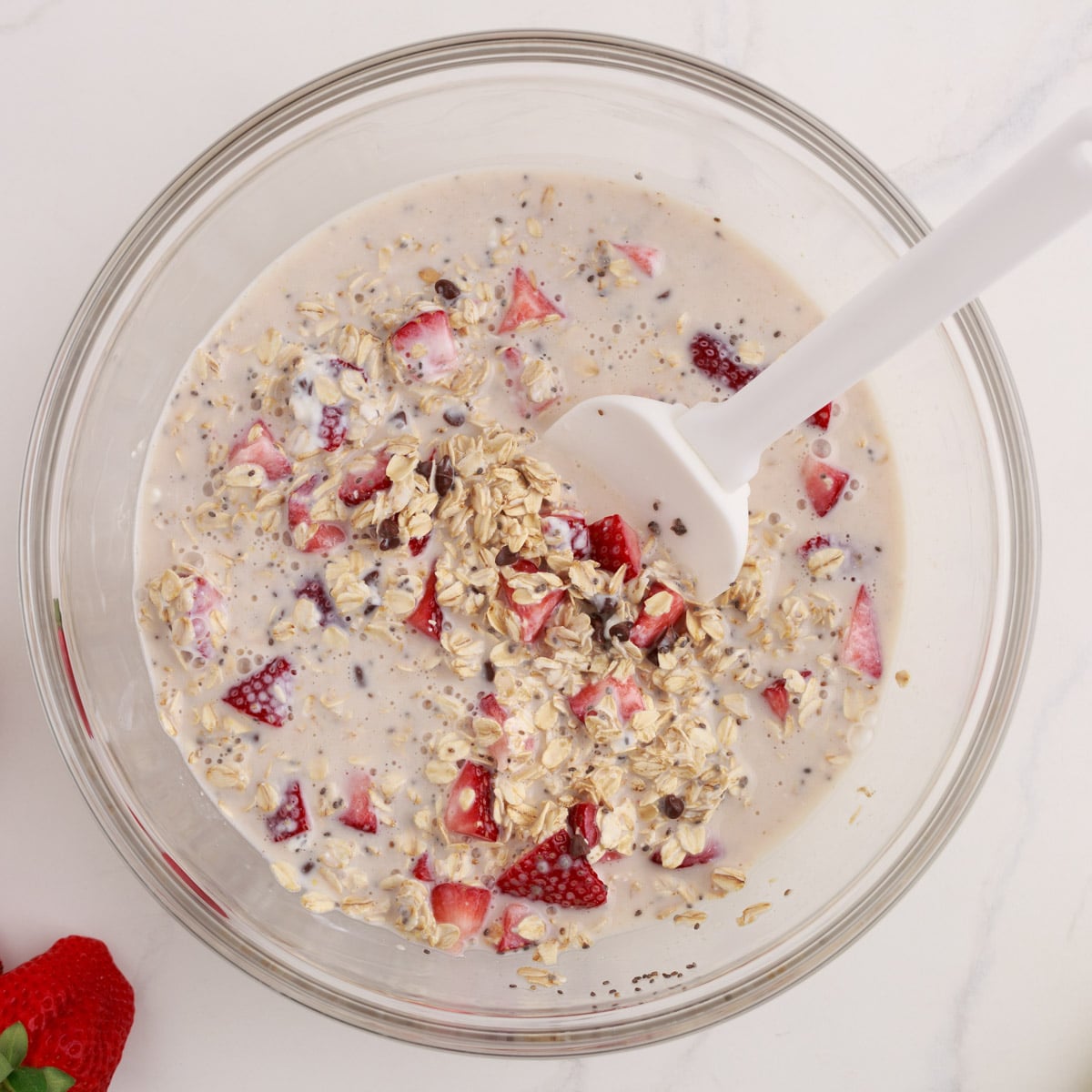 ingredients for strawberry banana overnight oats in a bowl