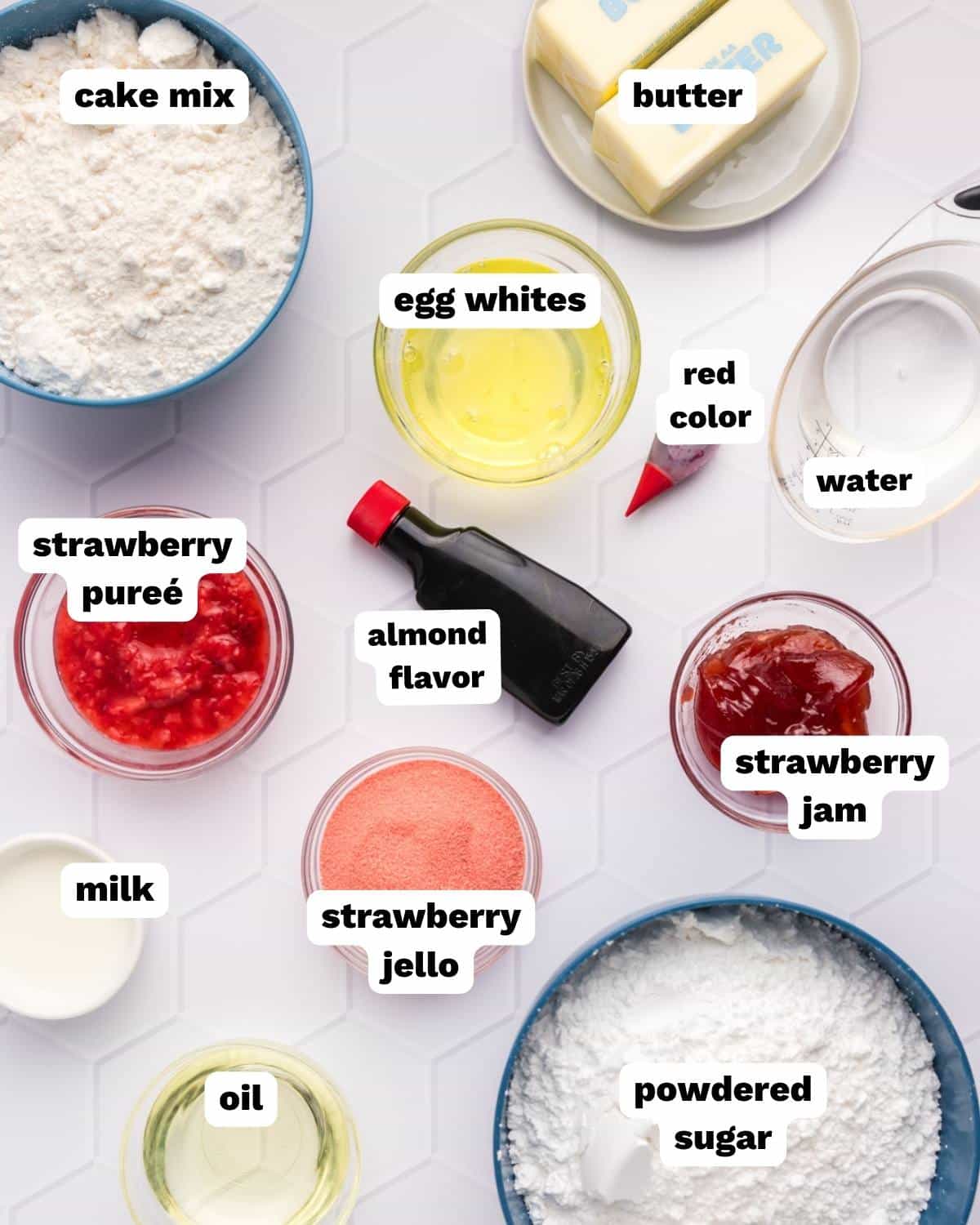 ingredients for strawberry cupcakes on a table