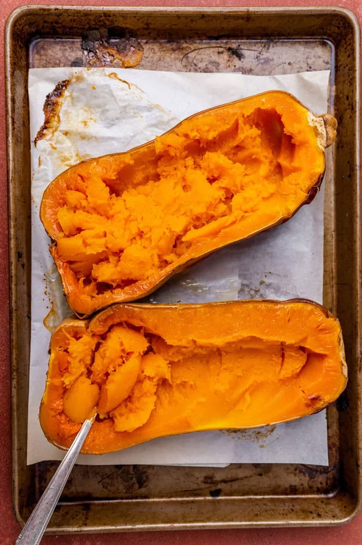 overhead view of baked butternut squash halves