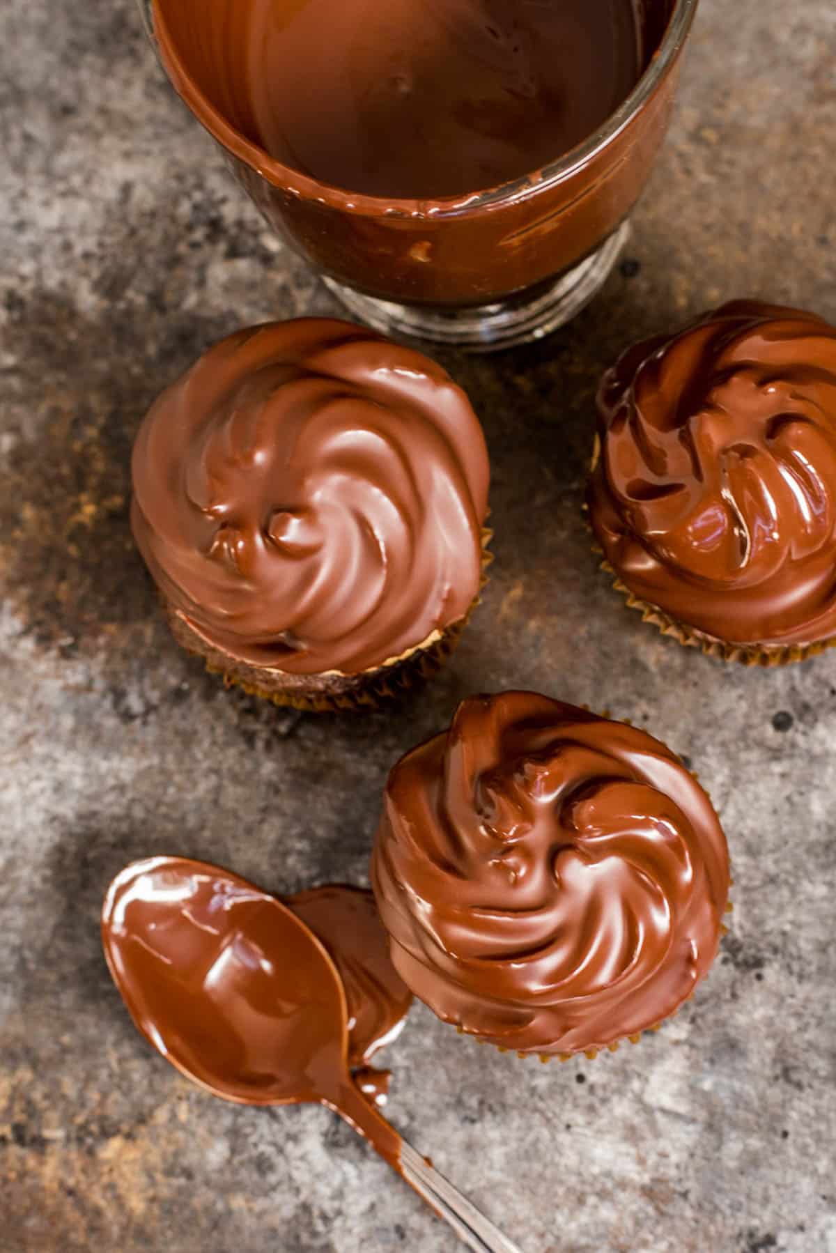 overhead view of chocolate topped peanut butter cupcakes