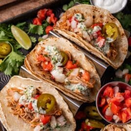 loaded chicken tacos on a serving platter