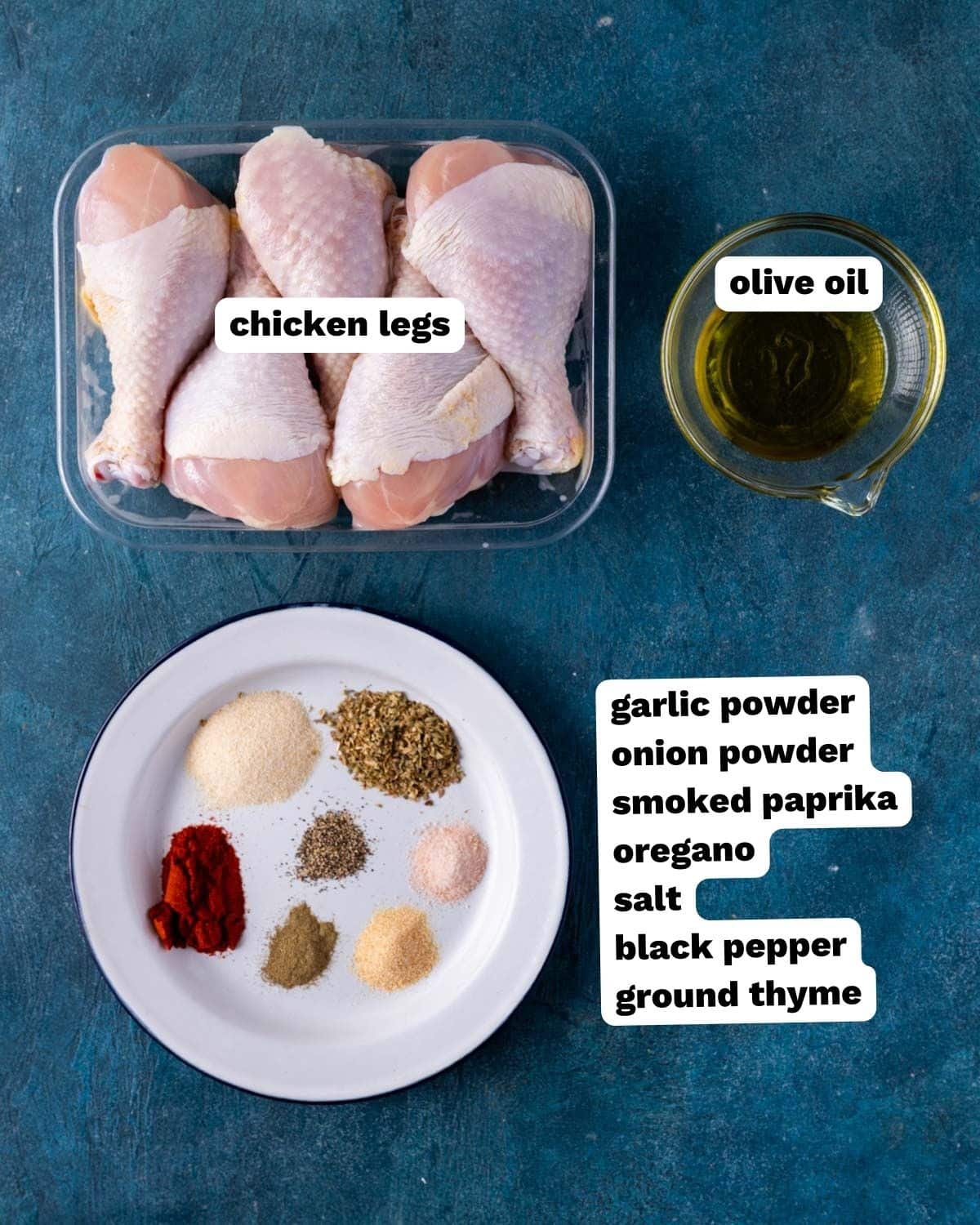 ingredients for seasoned chicken legs on a table