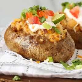closeup of a loaded mexican baked potato