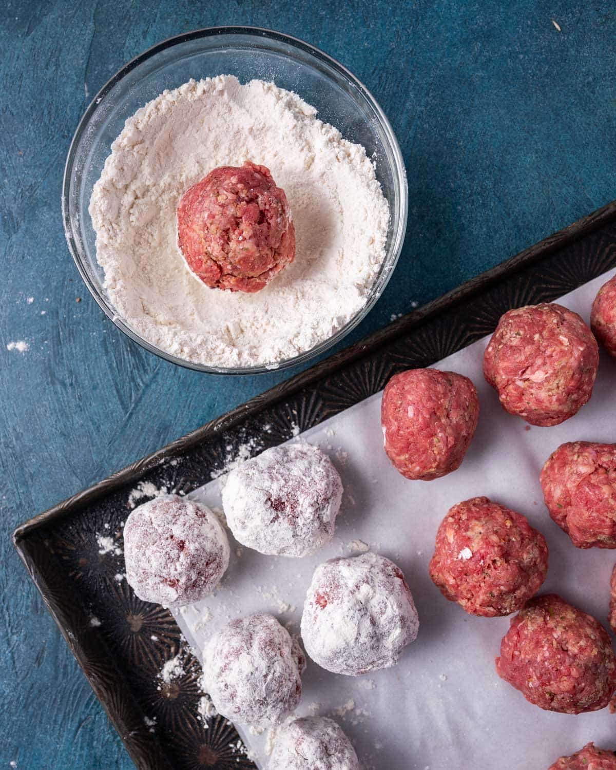 rolling meatballs in flour