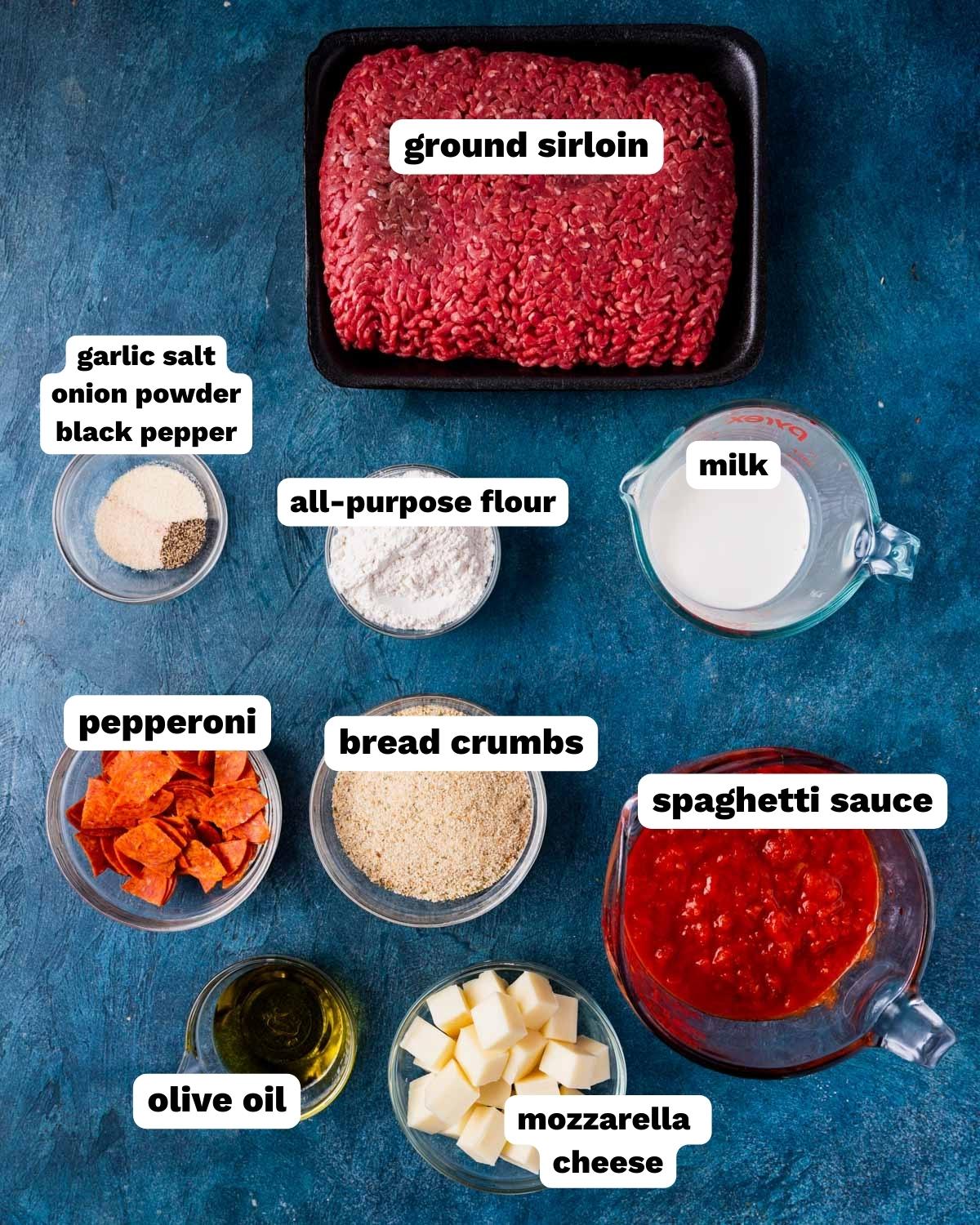ingredients for pizza meatballs on a table