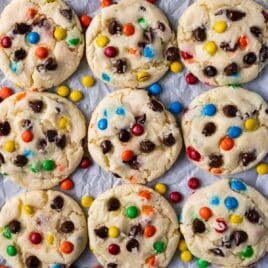 overhead view of m&m chocolate chip cookies on a table