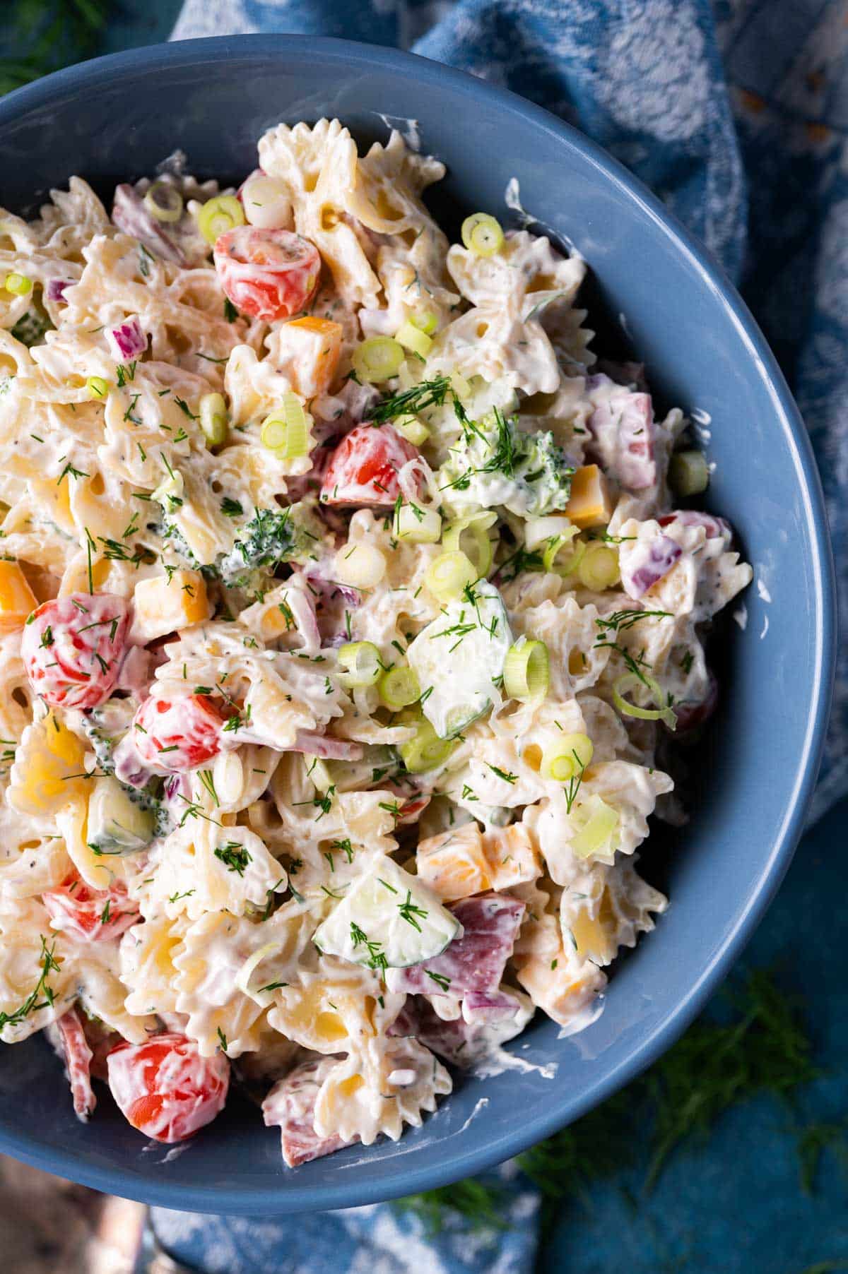 overhead view of a bowl of pasta salad with bowtie pasta