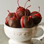 a bowl of chocolate covered cherries