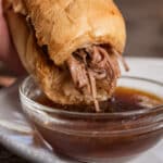 closeup of roast beef french dip sandwich