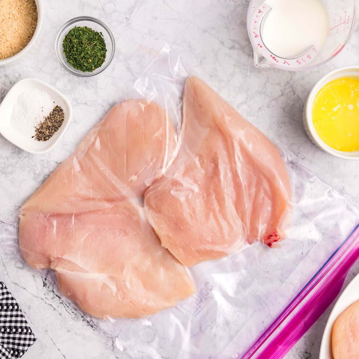 chicken pounded thin in a ziplock bag
