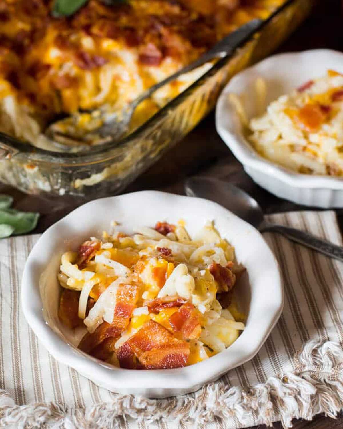 two bowls of breakfast egg casserole on a table