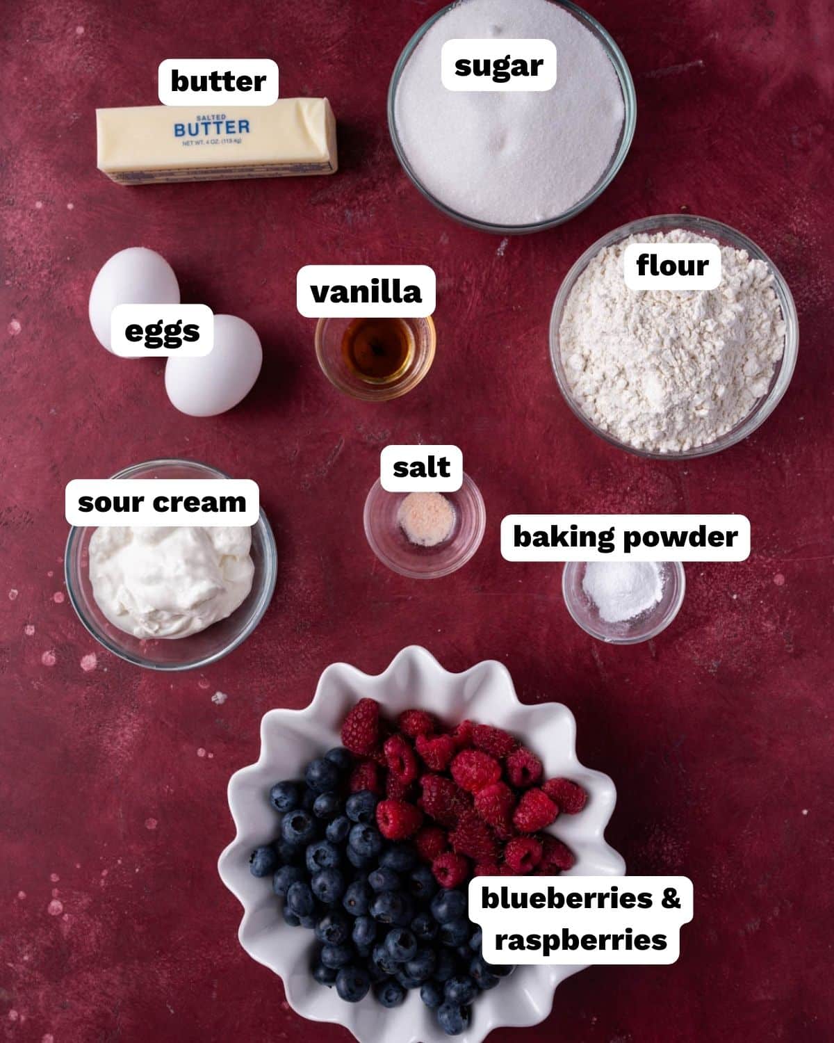 ingredients for raspberry blueberry cake on a table