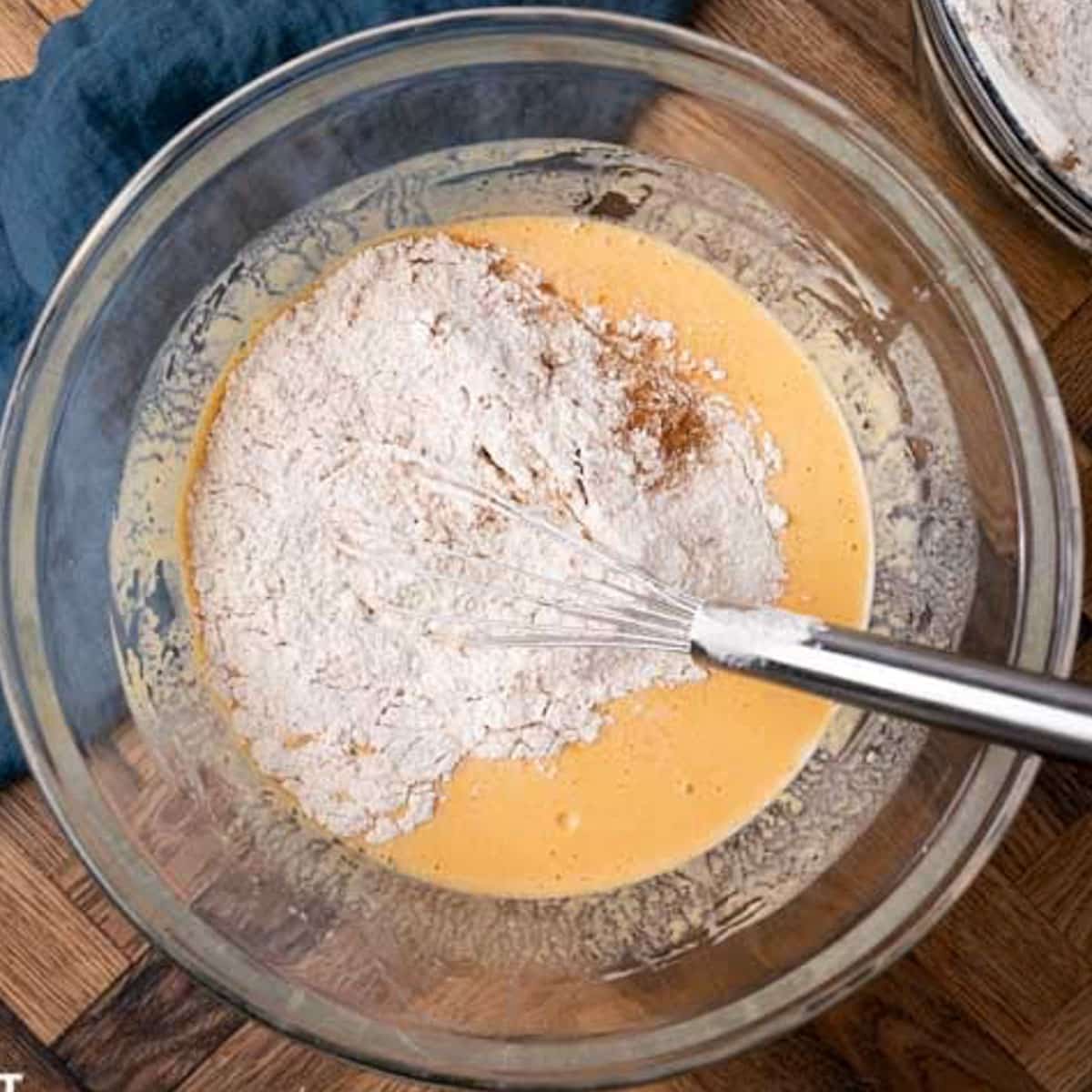 dry ingredients over wet ingredients in a bowl