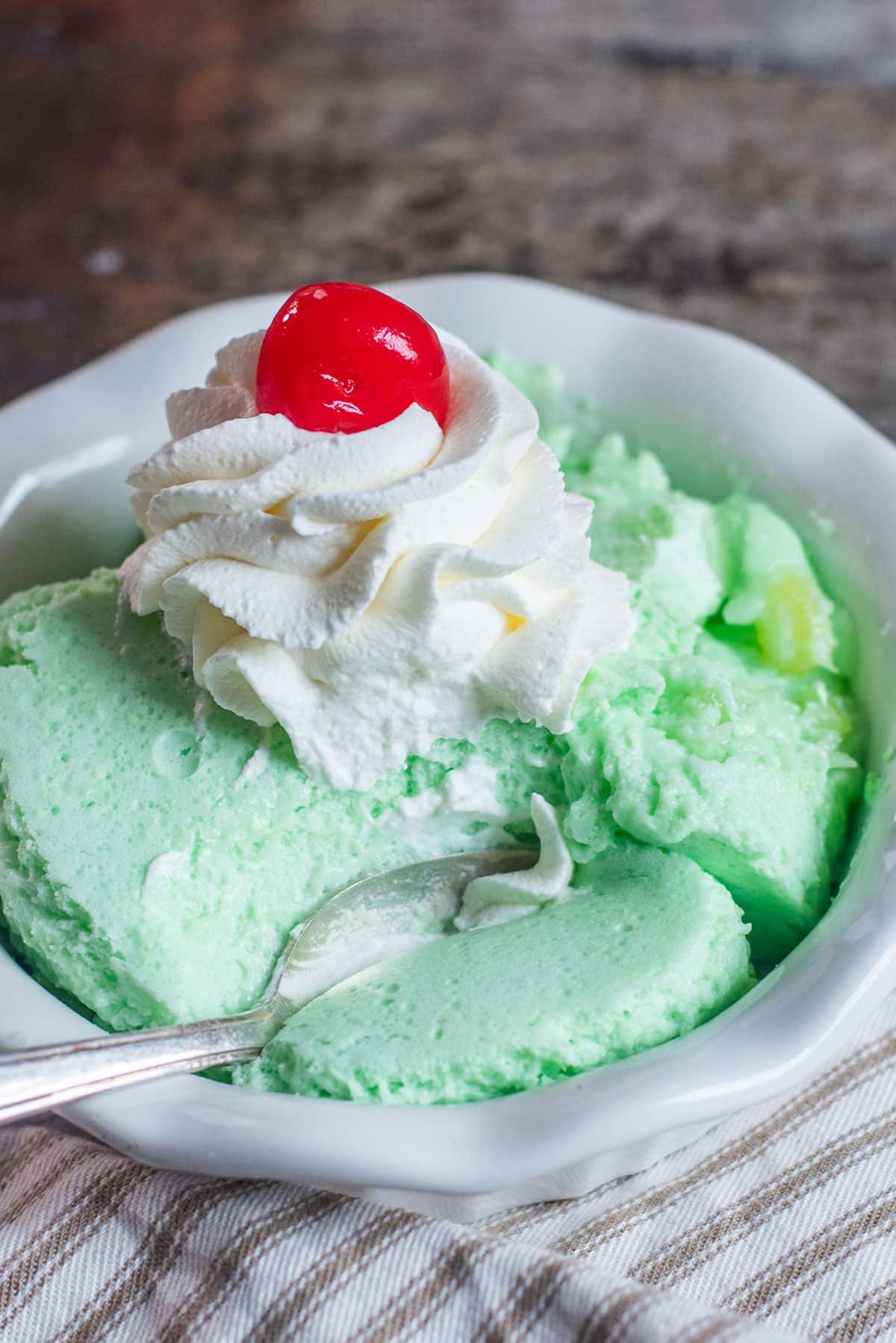 7up salad with lime jello in a bowl