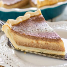 a piece of apple butter pie on a pie plate