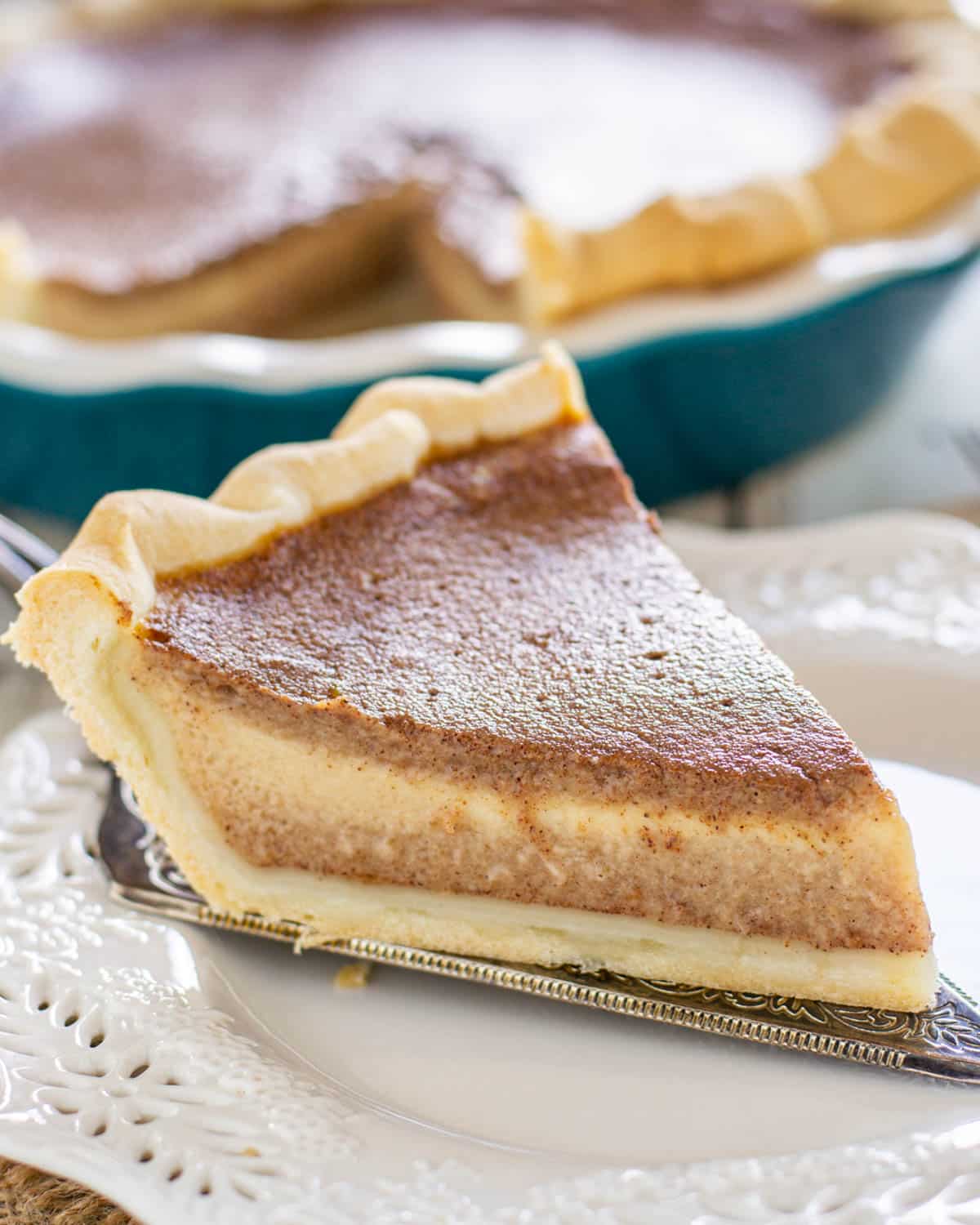 a piece of apple butter pie on a pie plate