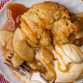 closeup of biscuit apple cobbler with ice cream