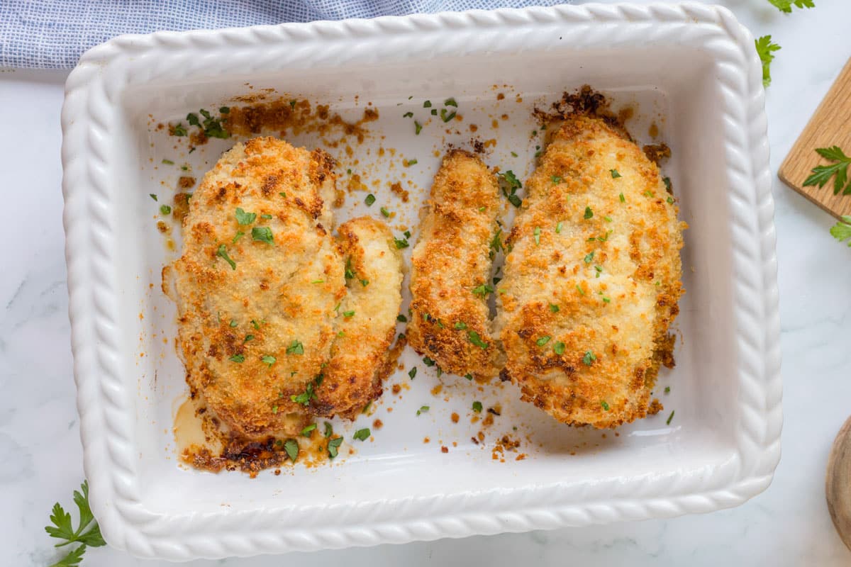 baked ranch chicken in a white baking dish