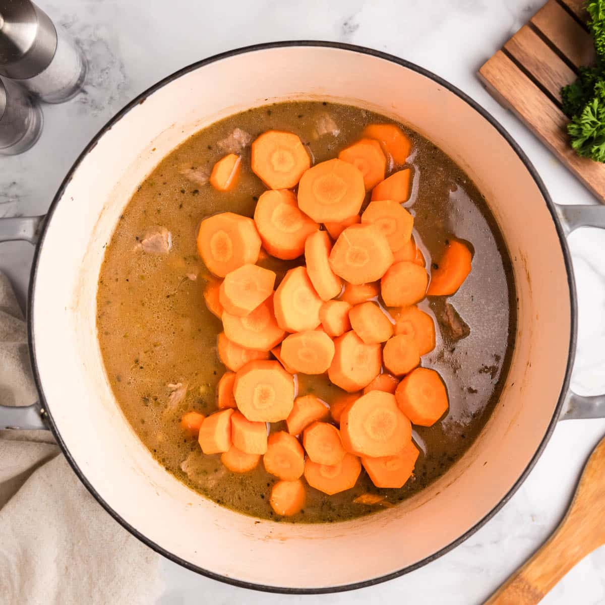 uncooked beef barley soup in a pot