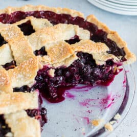 closeup of blueberry pie with blackberries