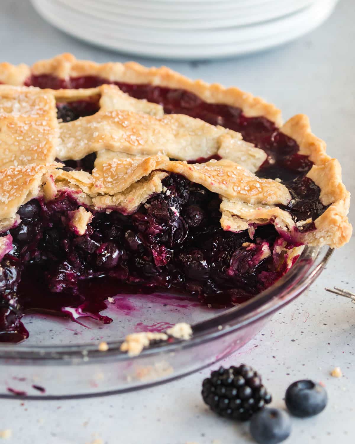 closeup of blueberry pie with blackberries