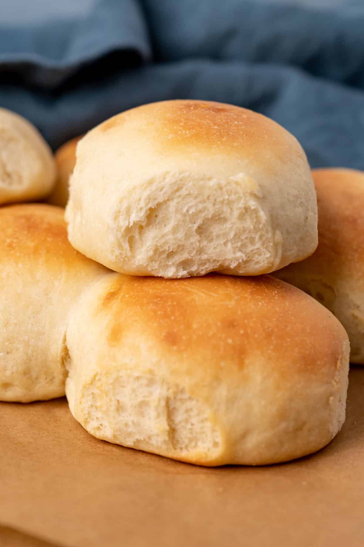 two dinner rolls sitting on top of each other