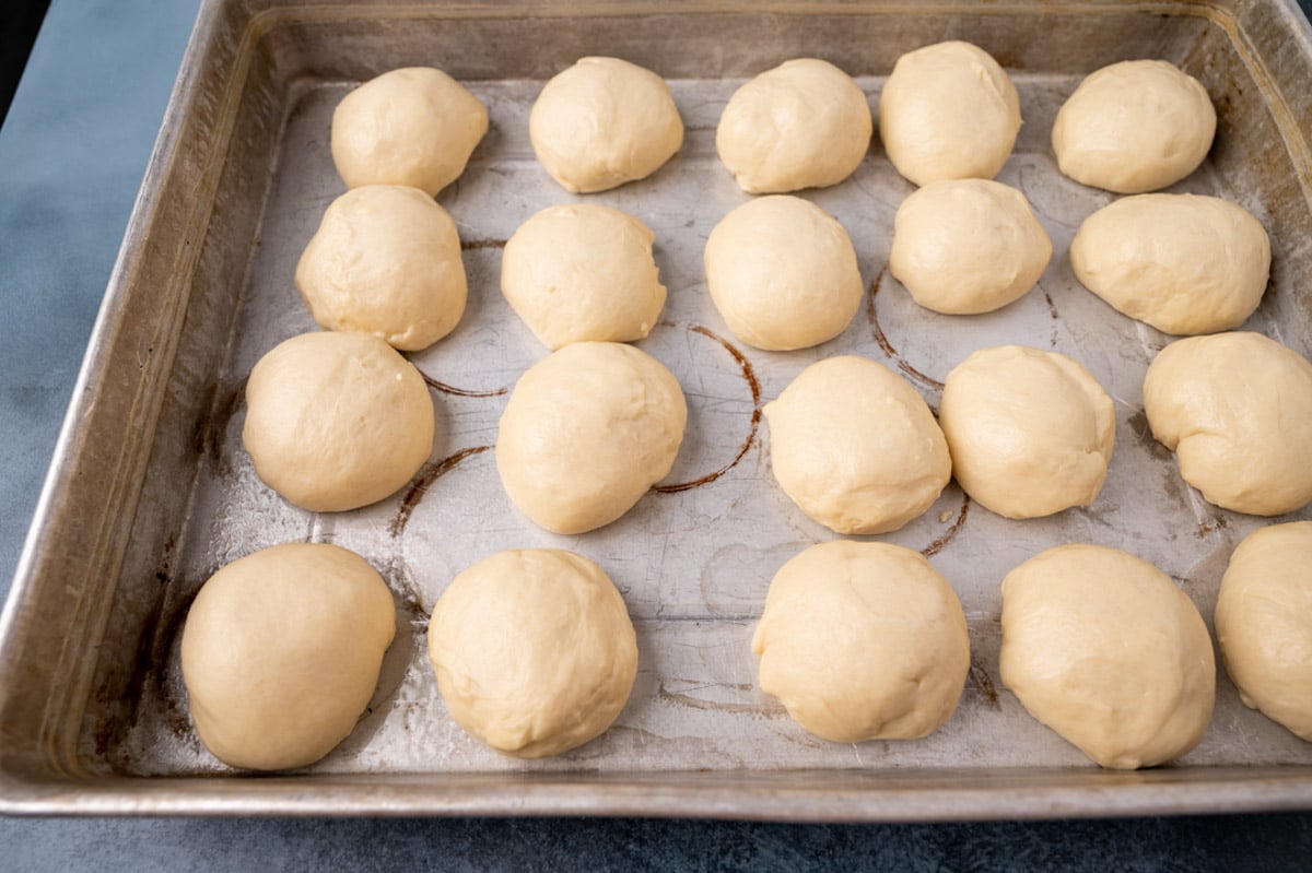 dough balls for rolls in a baking pan