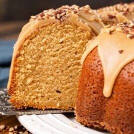 a spatula pulling out a slice of brown sugar pound cake