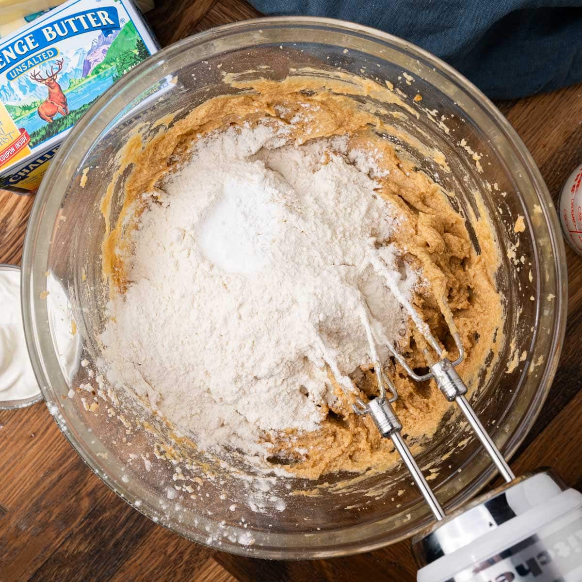 mixing dry ingredients into cake batter