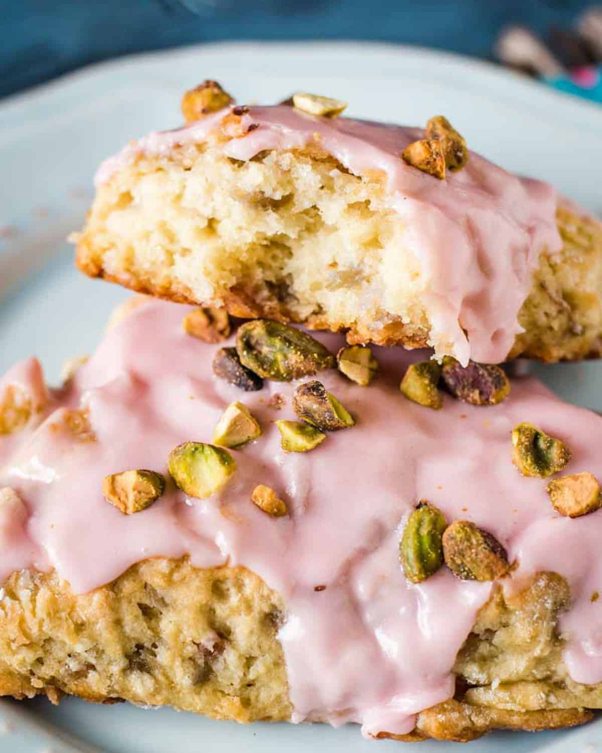 two buttermilk cherry scones, one with a bite out