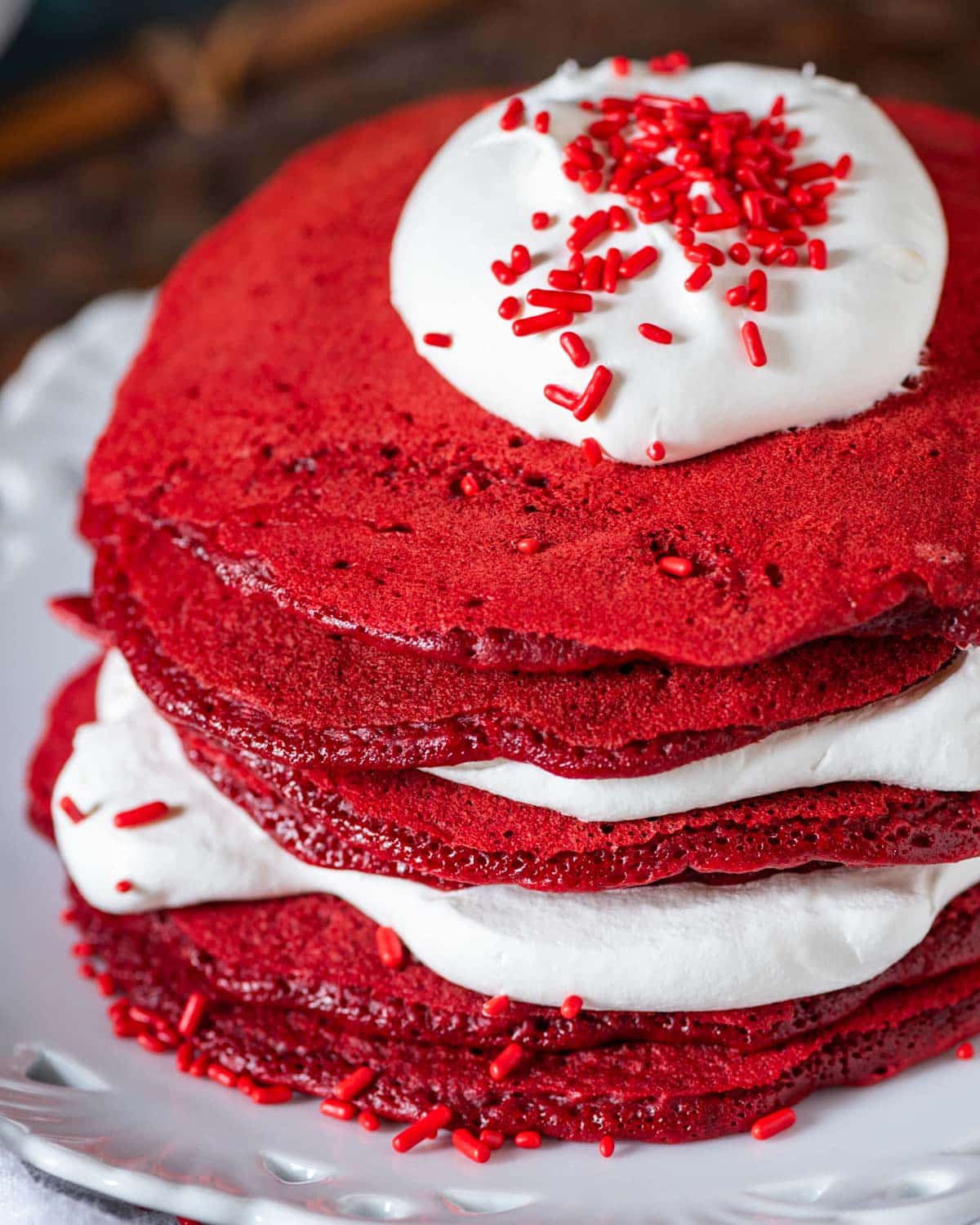 a stack of red cake mix pancakes