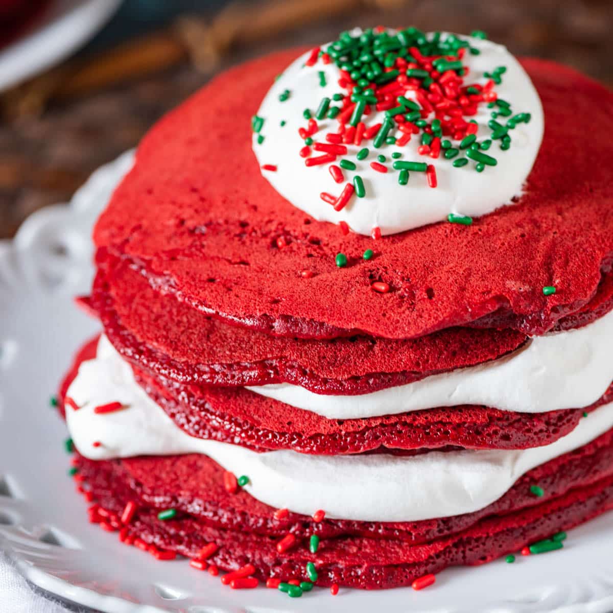 a stack of red christmas cake mix pancakes